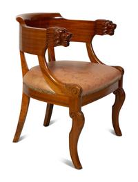 A Regency Style Carved Mahogany Barrel Back Armchair with Lion Head Terminals — 19TH/20TH CENTURY