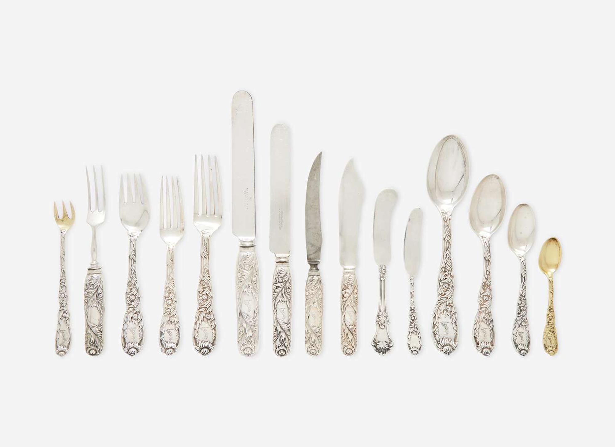 A sterling silver flatware service for eighteen in the "Indian Chrysanthemum" pattern, Tiffany & Co., New York, NY, circa 1880