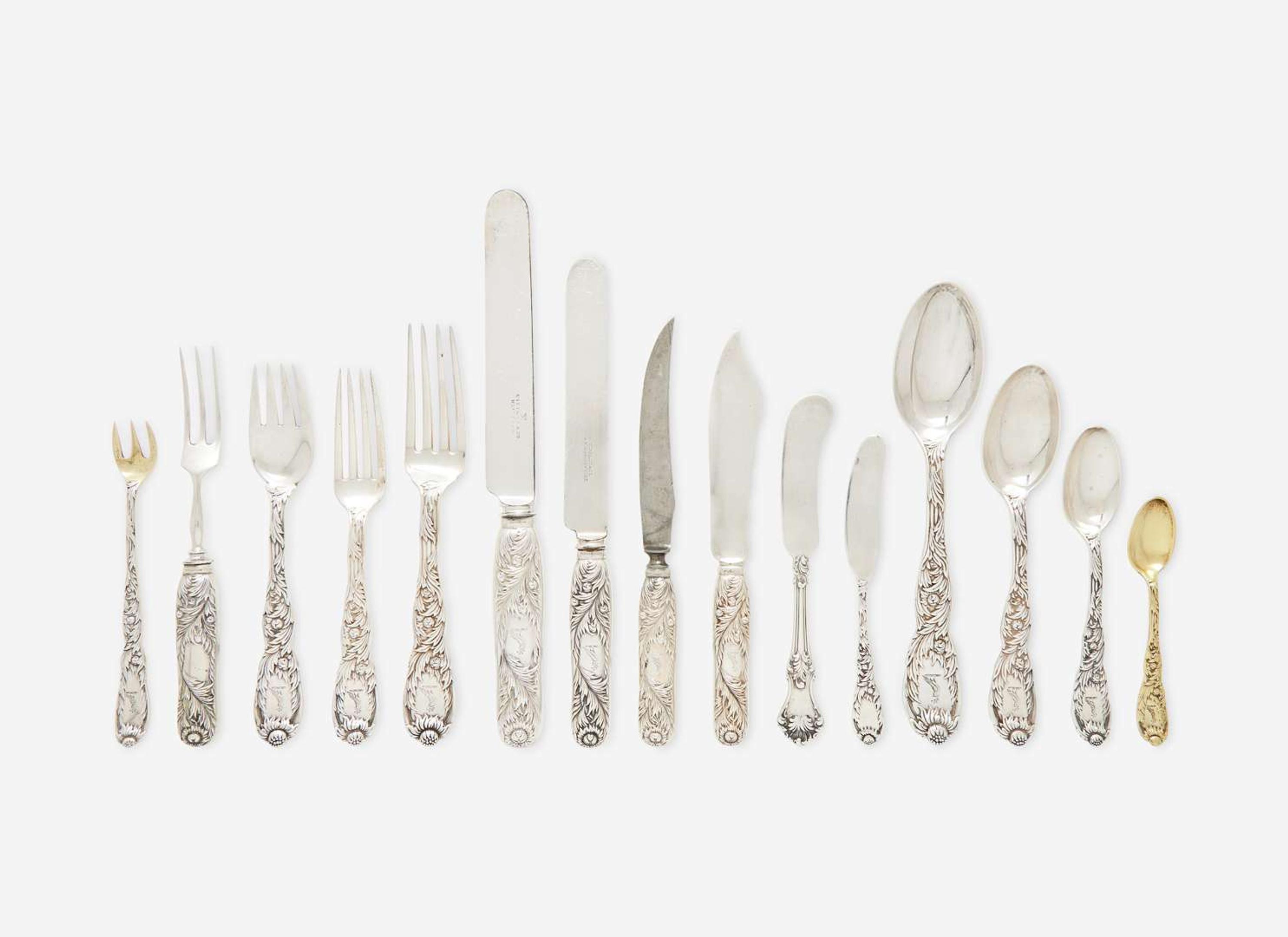 A sterling silver flatware service for eighteen in the "Indian Chrysanthemum" pattern, Tiffany & Co., New York, NY, circa 1880
