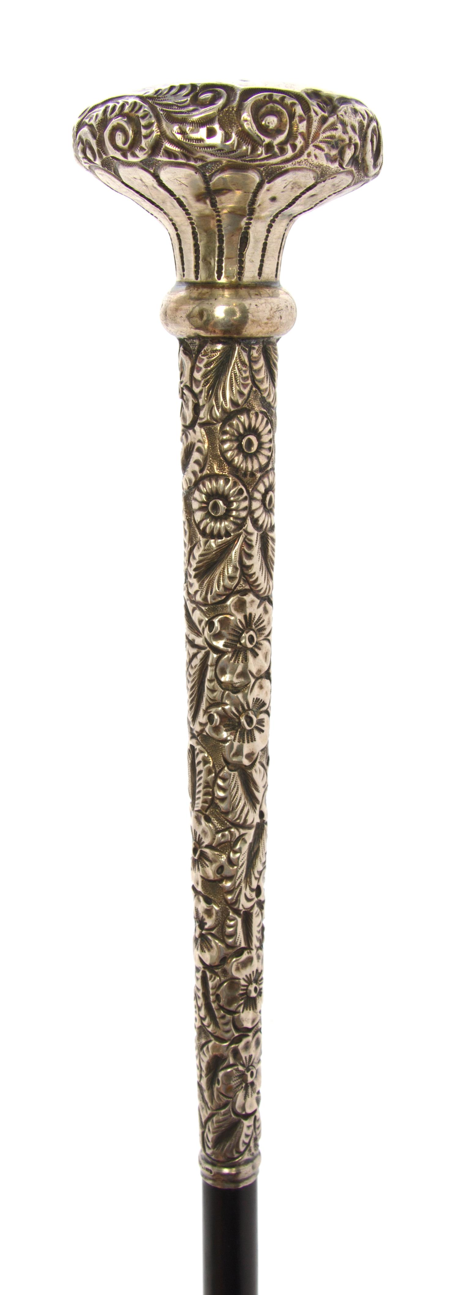 An American Silver Presentation Walking Stick, Length of handle 1 7/8 x length overall 35 1/4 inches.