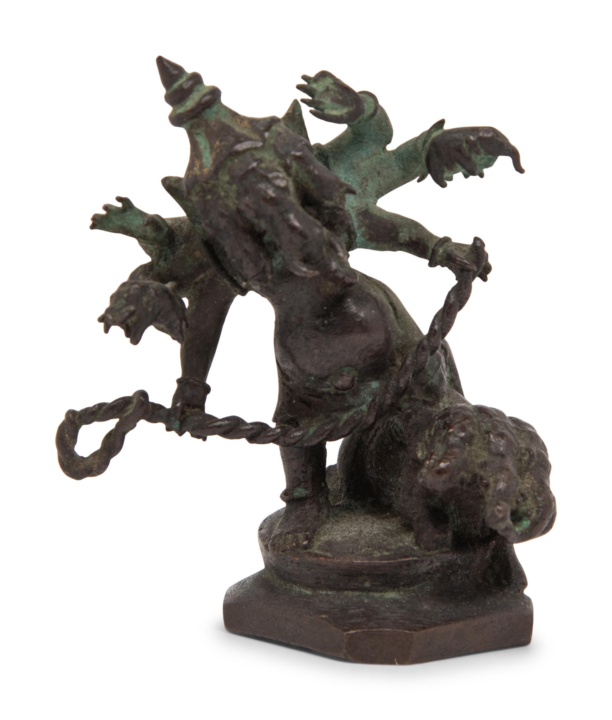An Indian Bronze Figure of Multi-Armed Ganesha