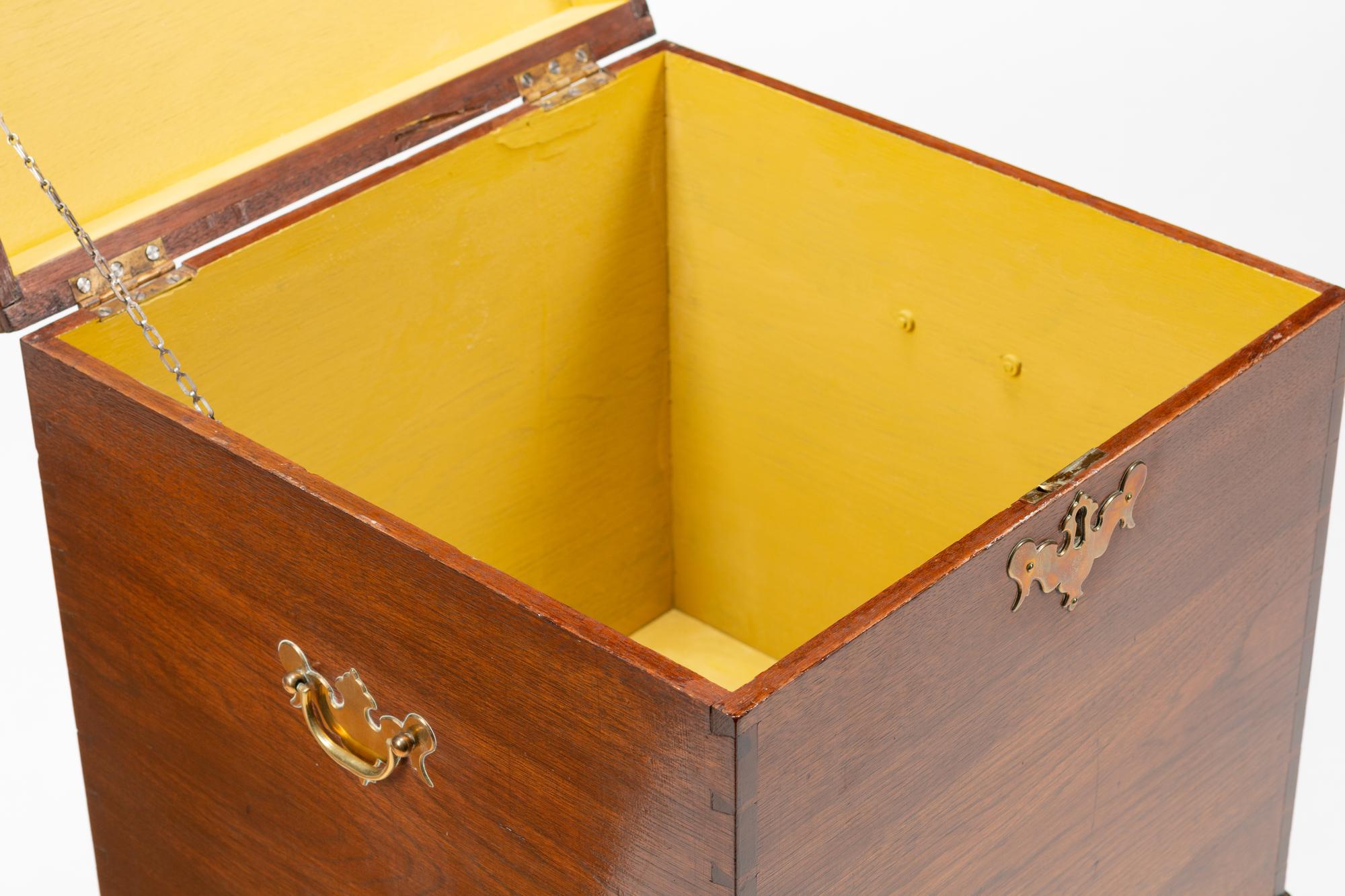 An English Mahogany Cellarette on a Later Stand