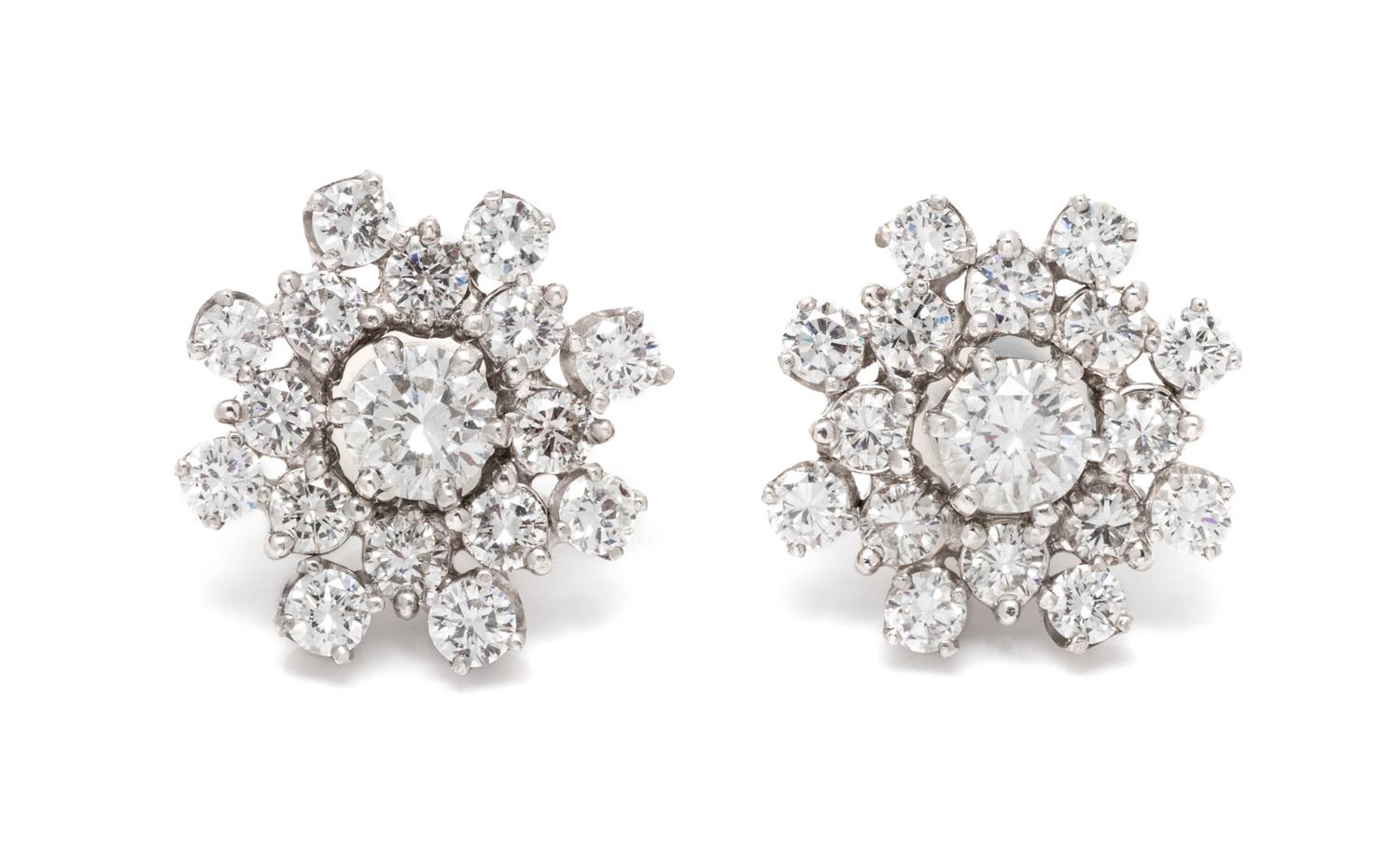 A Pair of White Gold and Diamond Stud Earrings and Cluster Jackets, 3.60 dwts.