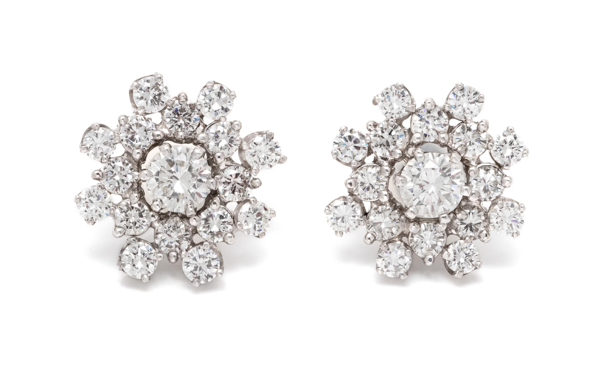 A Pair of White Gold and Diamond Stud Earrings and Cluster Jackets, 3.60 dwts.