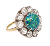 A Victorian Silver Topped Gold, Black Opal and Diamond Ring, 4.60 dwts.
