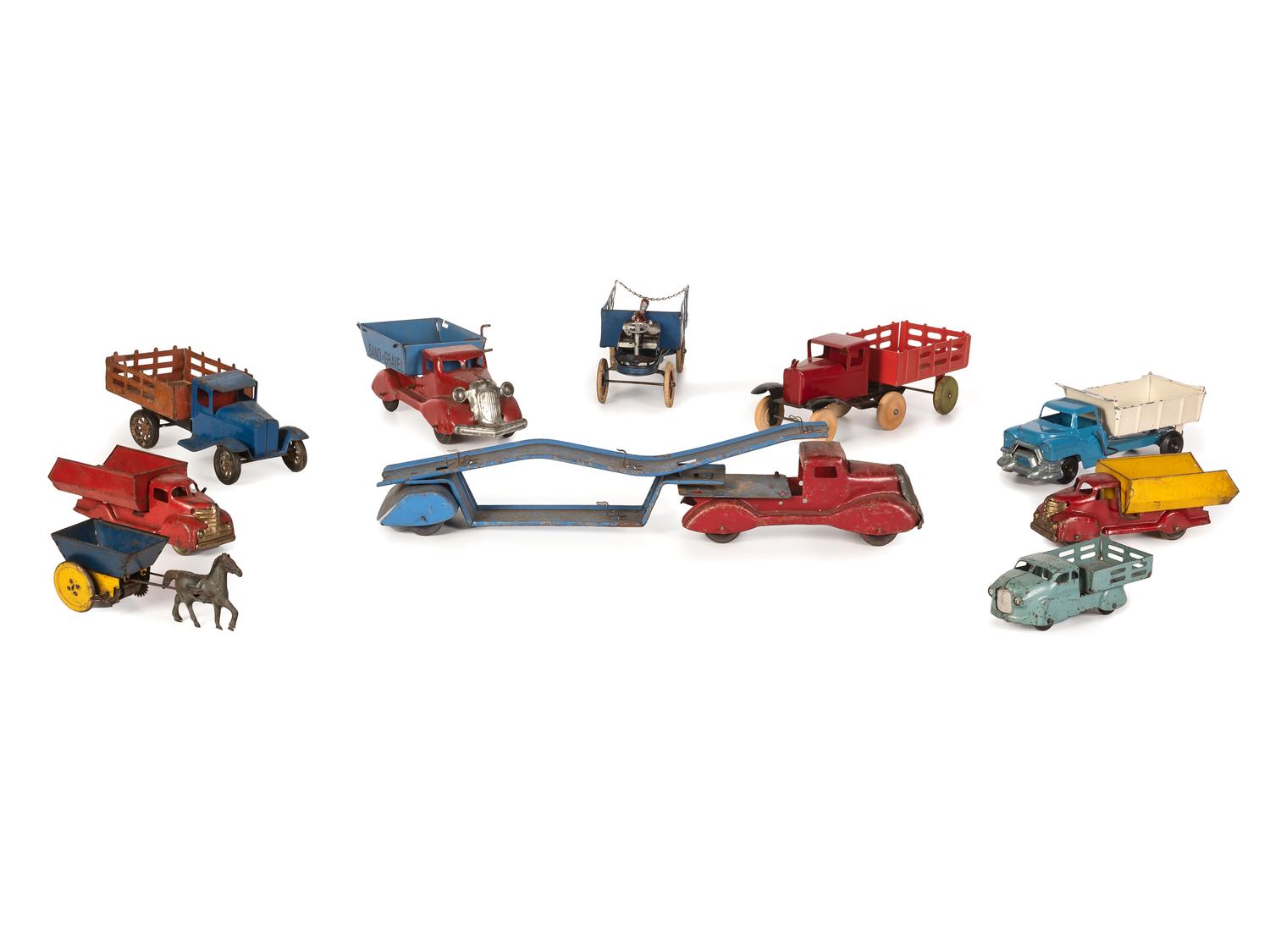 Ten Tin and Pressed Steel Toy Trucks and Wagons