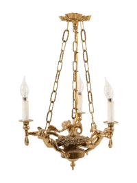 A Continental Gilt Metal Figural Three-Light Chandelier