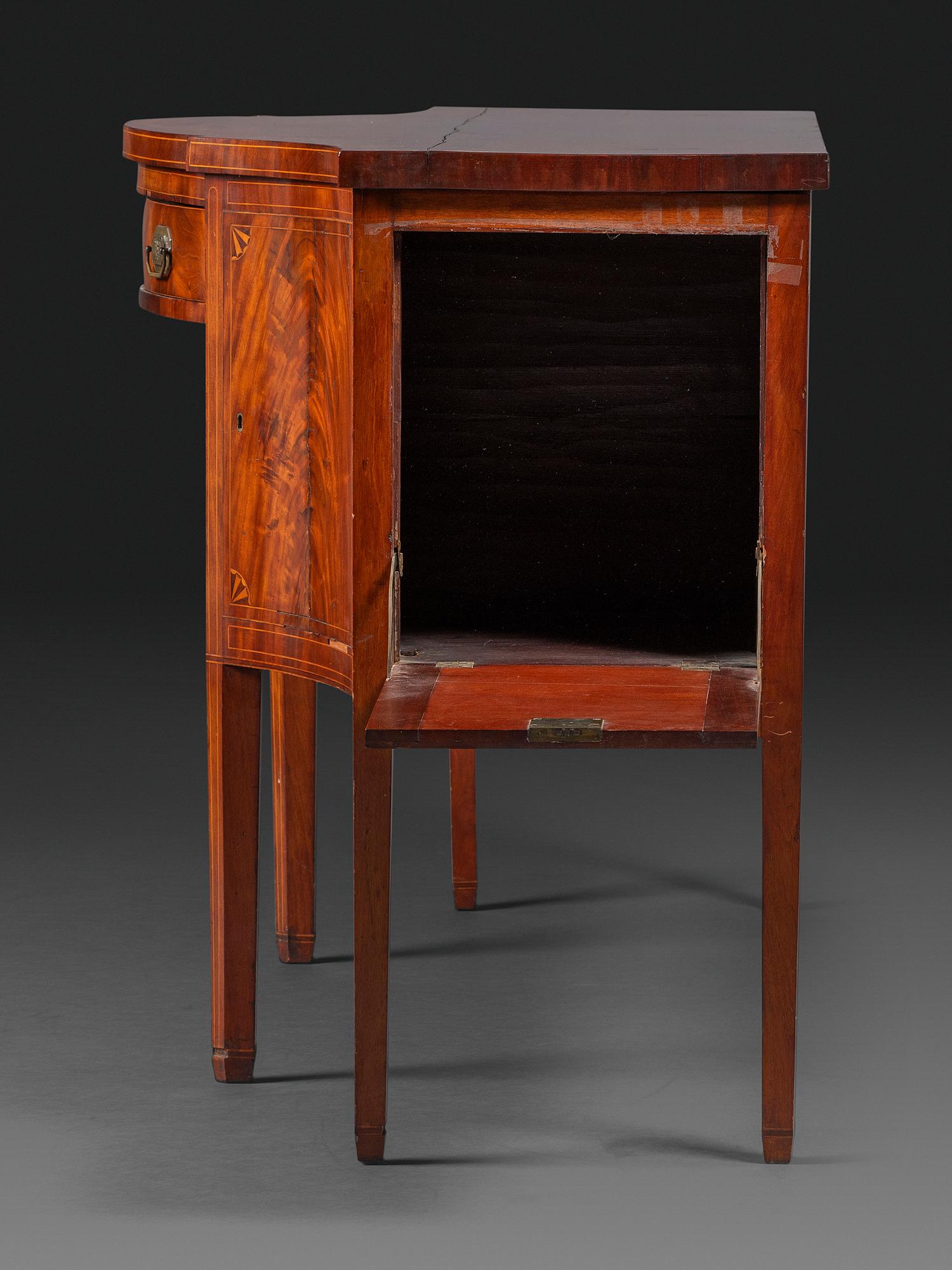 A Federal Fan-Inlaid and Figured Mahogany Serpentine Sideboard
