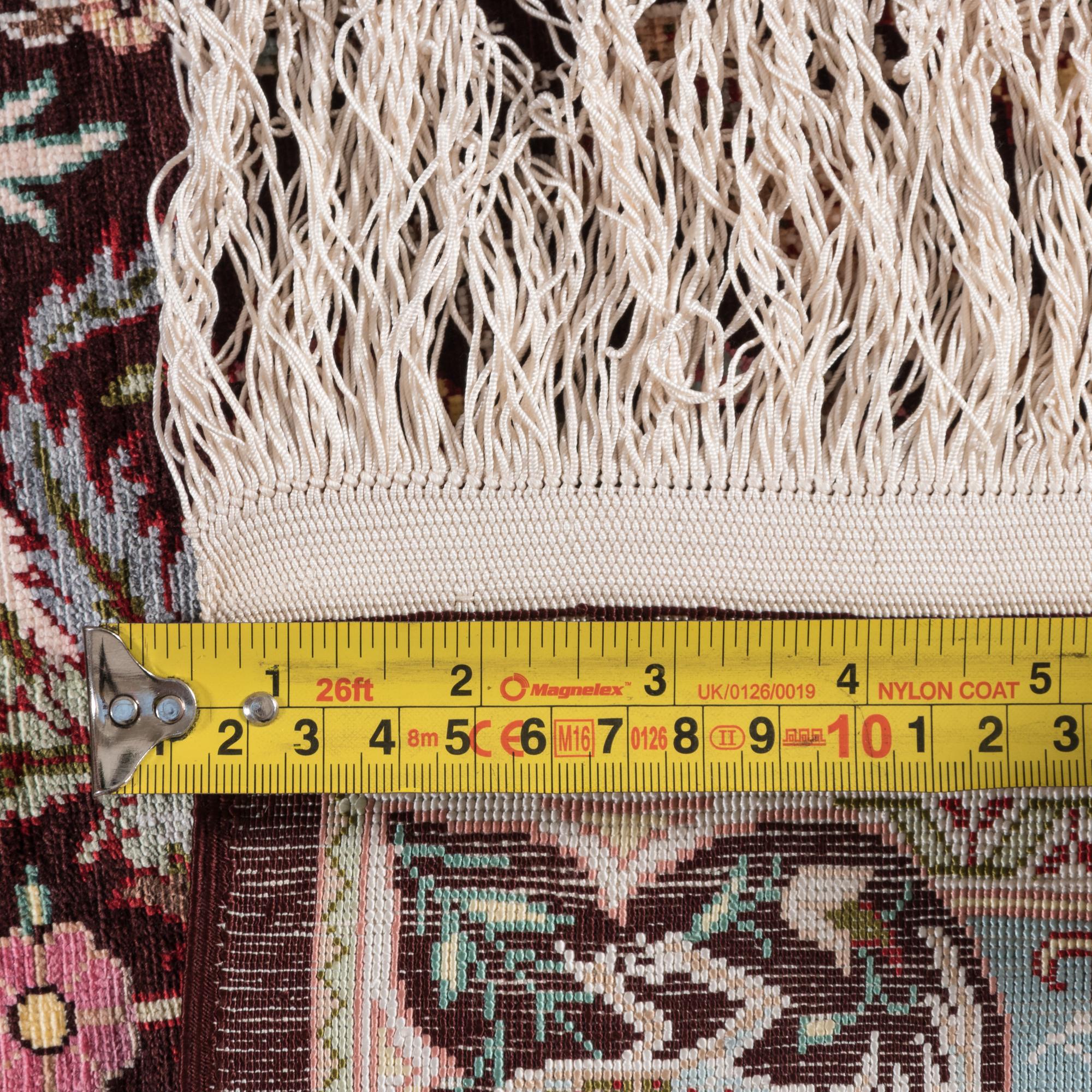 A Turkish Silk Prayer Rug