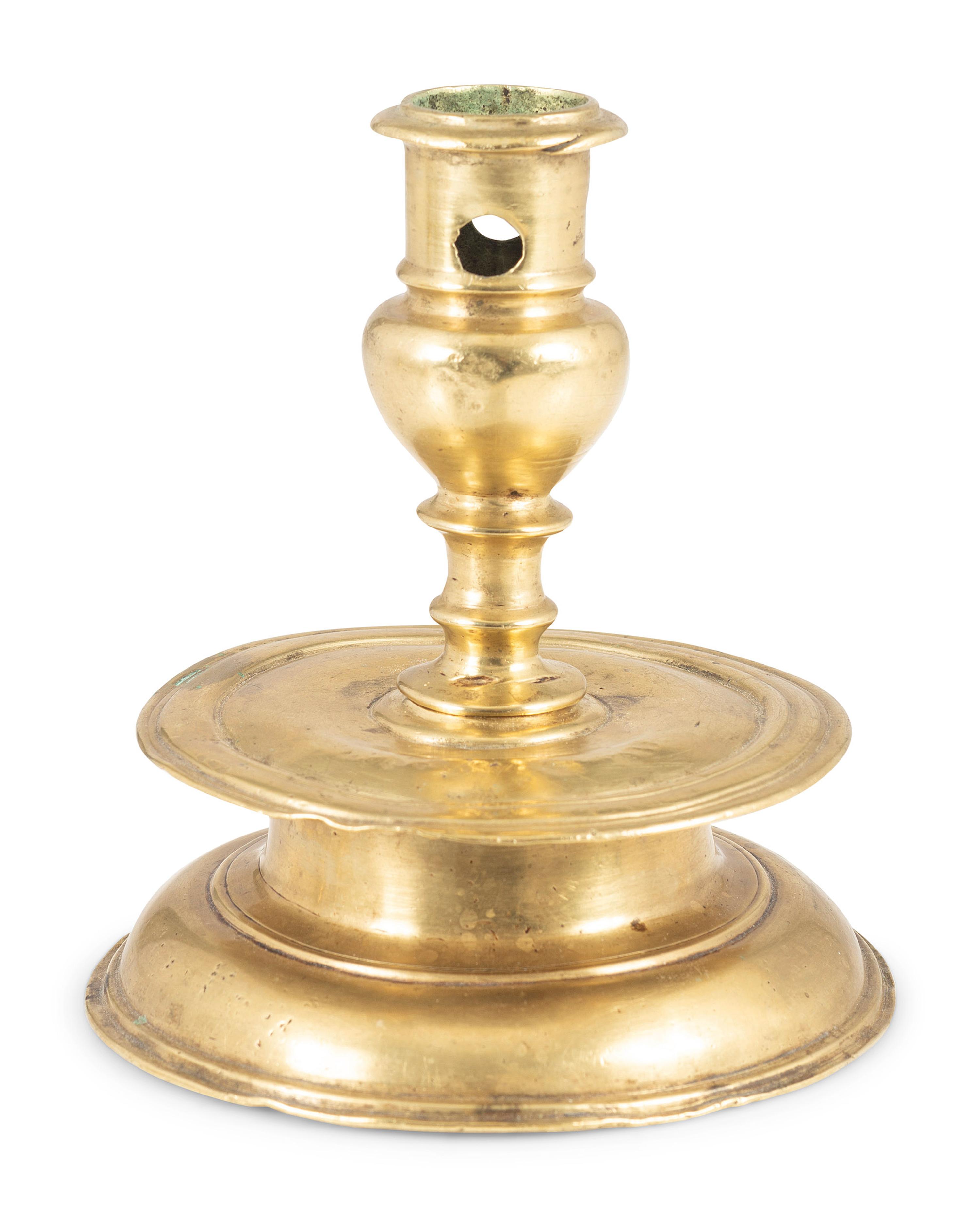 A Continental Brass Capstan Candlestick