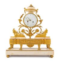 A French Gilt Bronze and Marble Mantel Clock with a Decimal and Conventional Dial Height 19 x width 15 7/8 inches. — CIRCA 1795