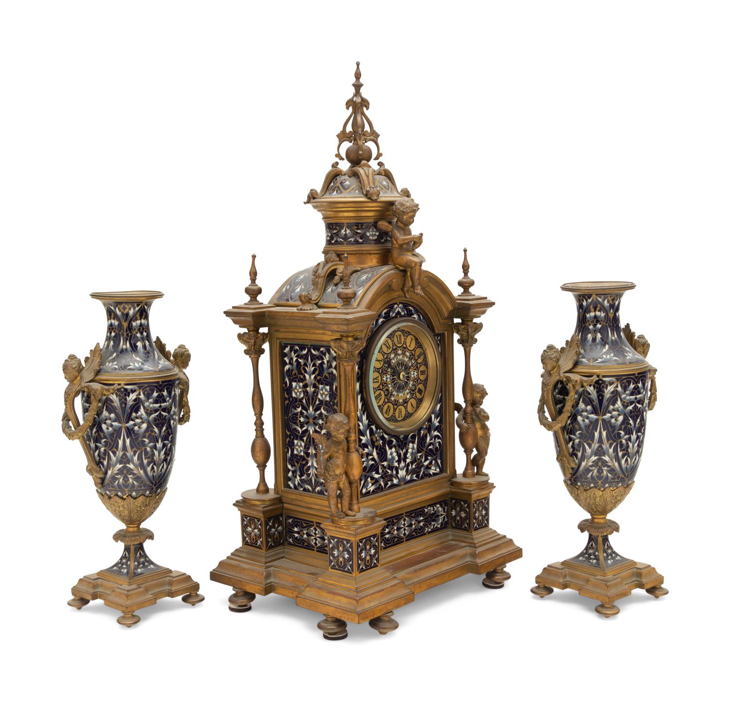 A French Gilt Bronze and Enamel Clock Garniture