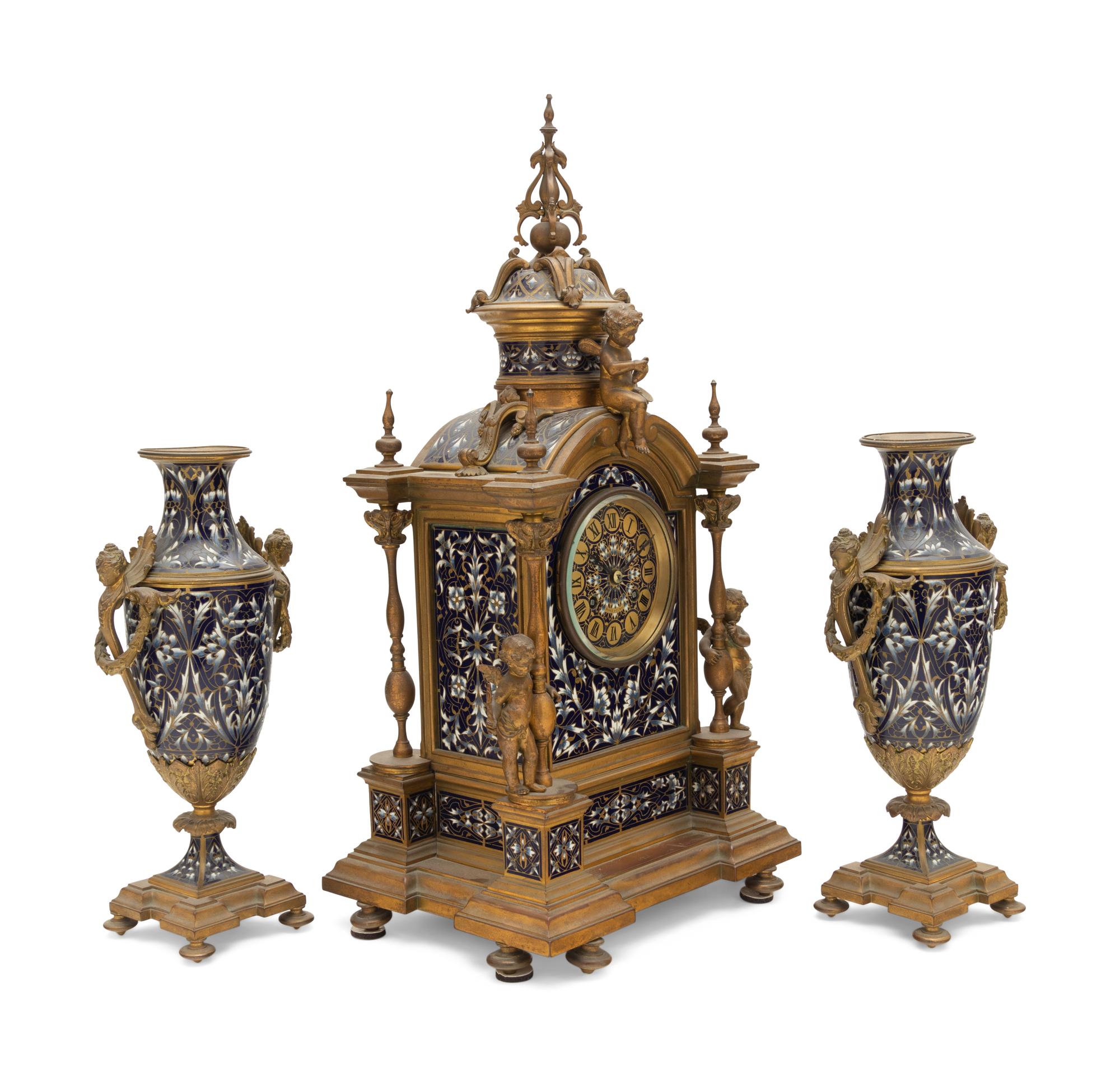 A French Gilt Bronze and Enamel Clock Garniture
