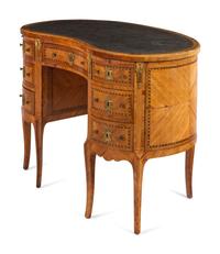 A Louis XV/XVI Transitional Style Kingwood and Parquetry Leather-Inset Reniform Bureau