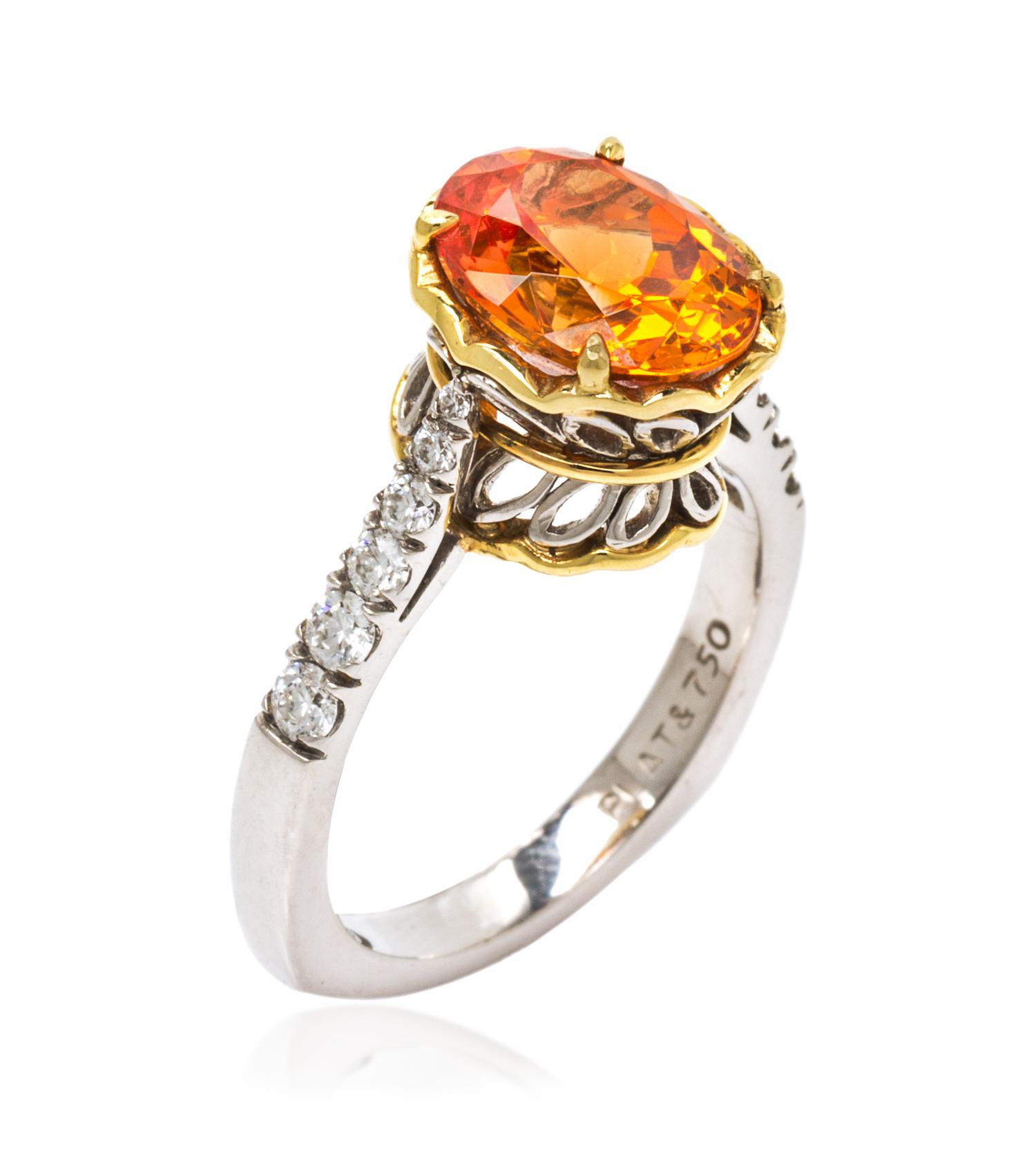 A Platinum, 18 Karat Yellow Gold, Spessartite and Diamond Ring, Richard Krementz, 5.40 dwts.