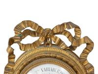 A Louis XVI Style Gilt Bronze Cartel Clock and Matching Barometer