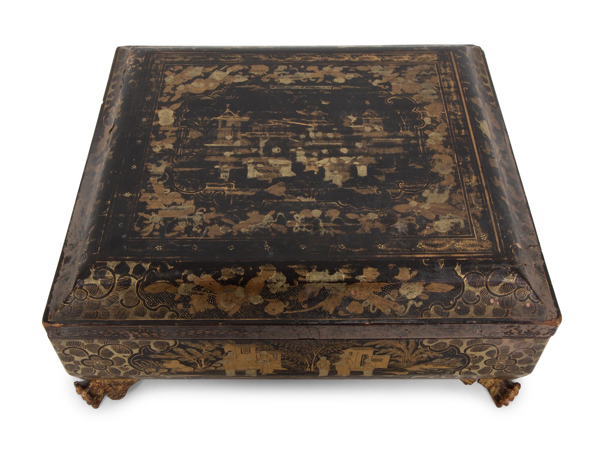 An English Chinoiserie Black and Gilt Laquer Game Box