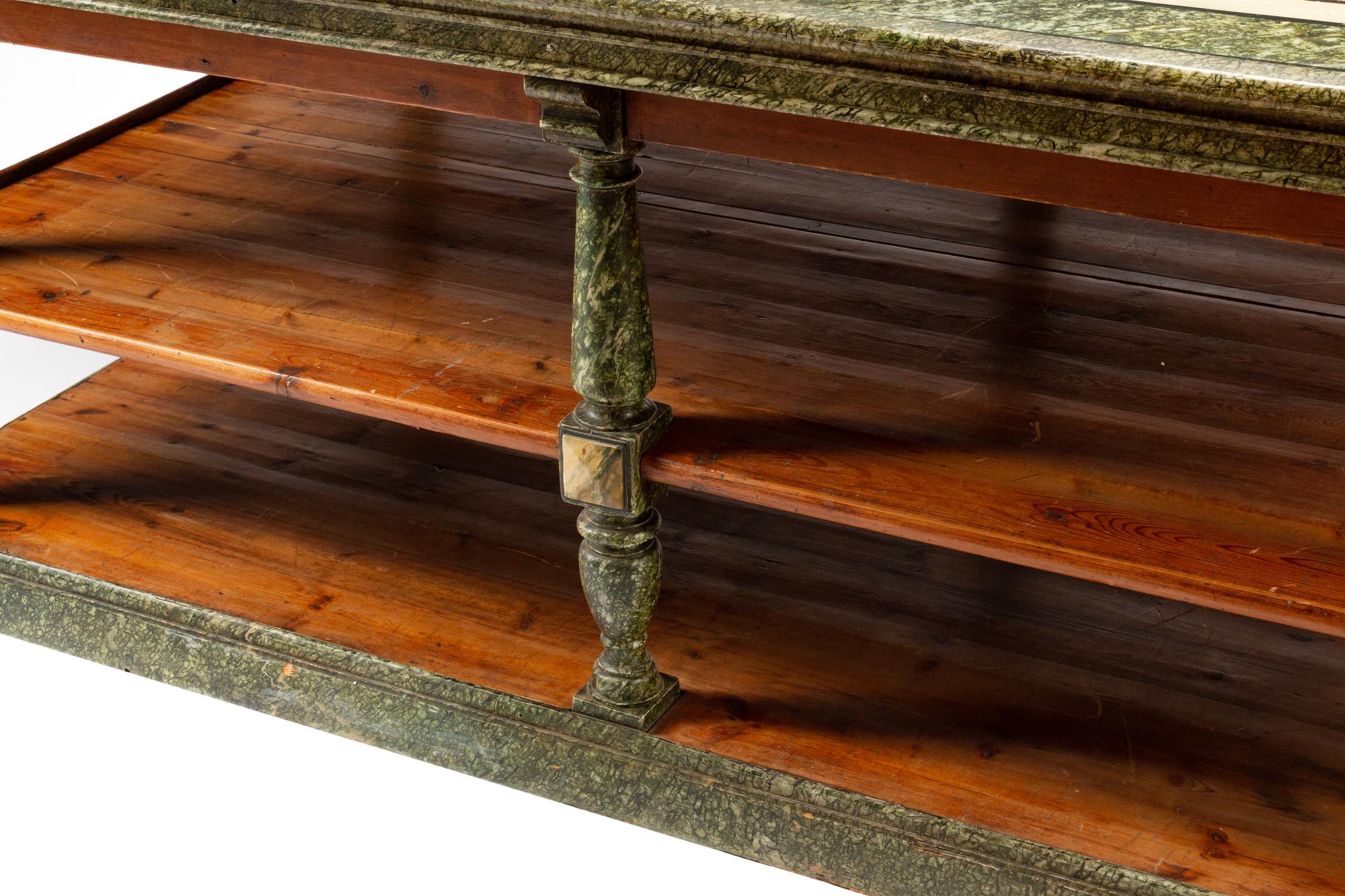 A Continental Faux Marble Painted Three-Tier Portfolio Table