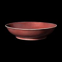A Chinese Copper Red Glazed Porcelain Plate, Possibly Qianlong Period 或爲清乾隆 寶石紅釉盤