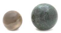 Two Round Hardstones Spheres Diameter of largest 3 inches. — 20TH CENTURY