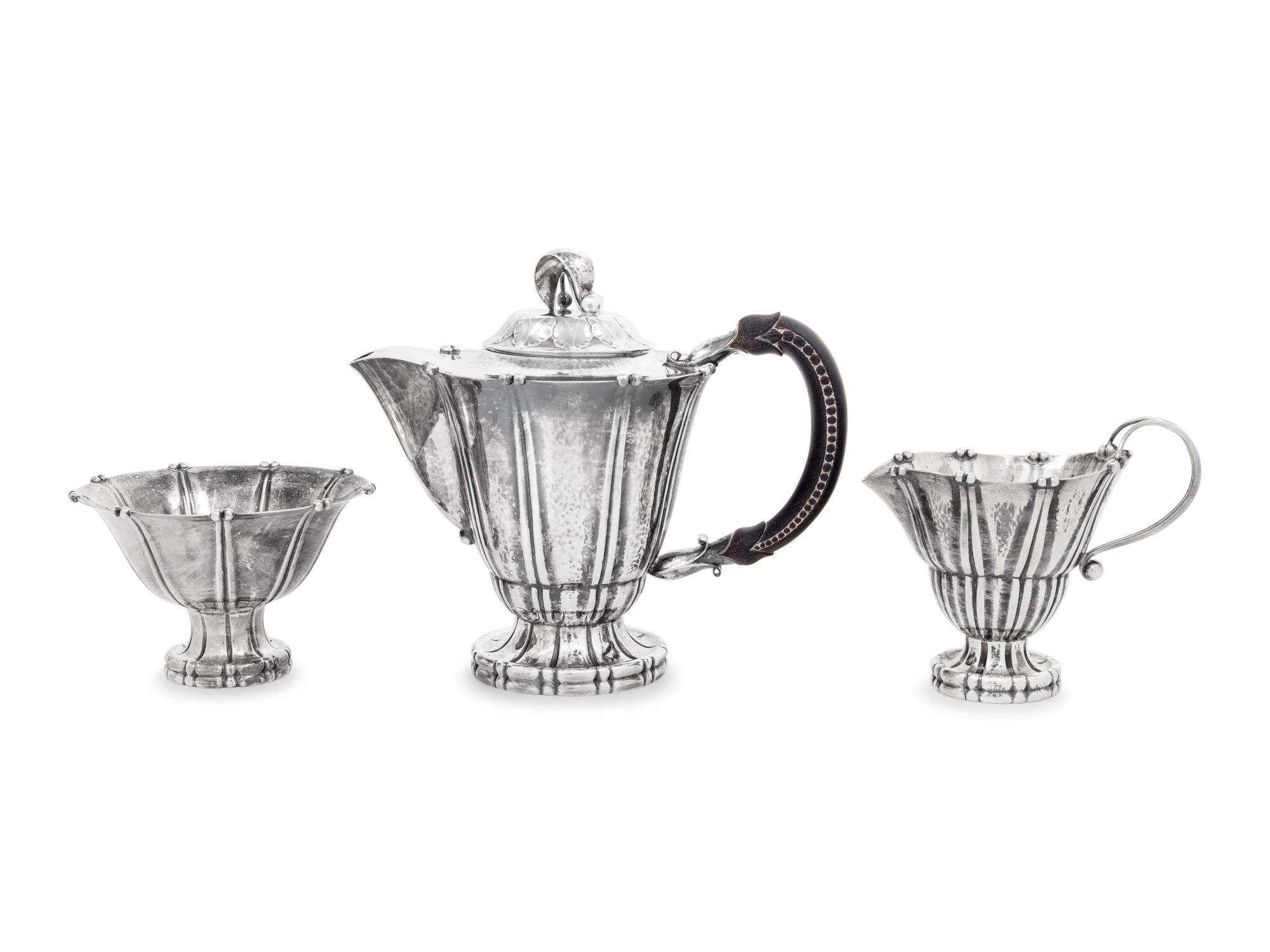 A Georg Jensen Three-Piece Silver Coffee Service