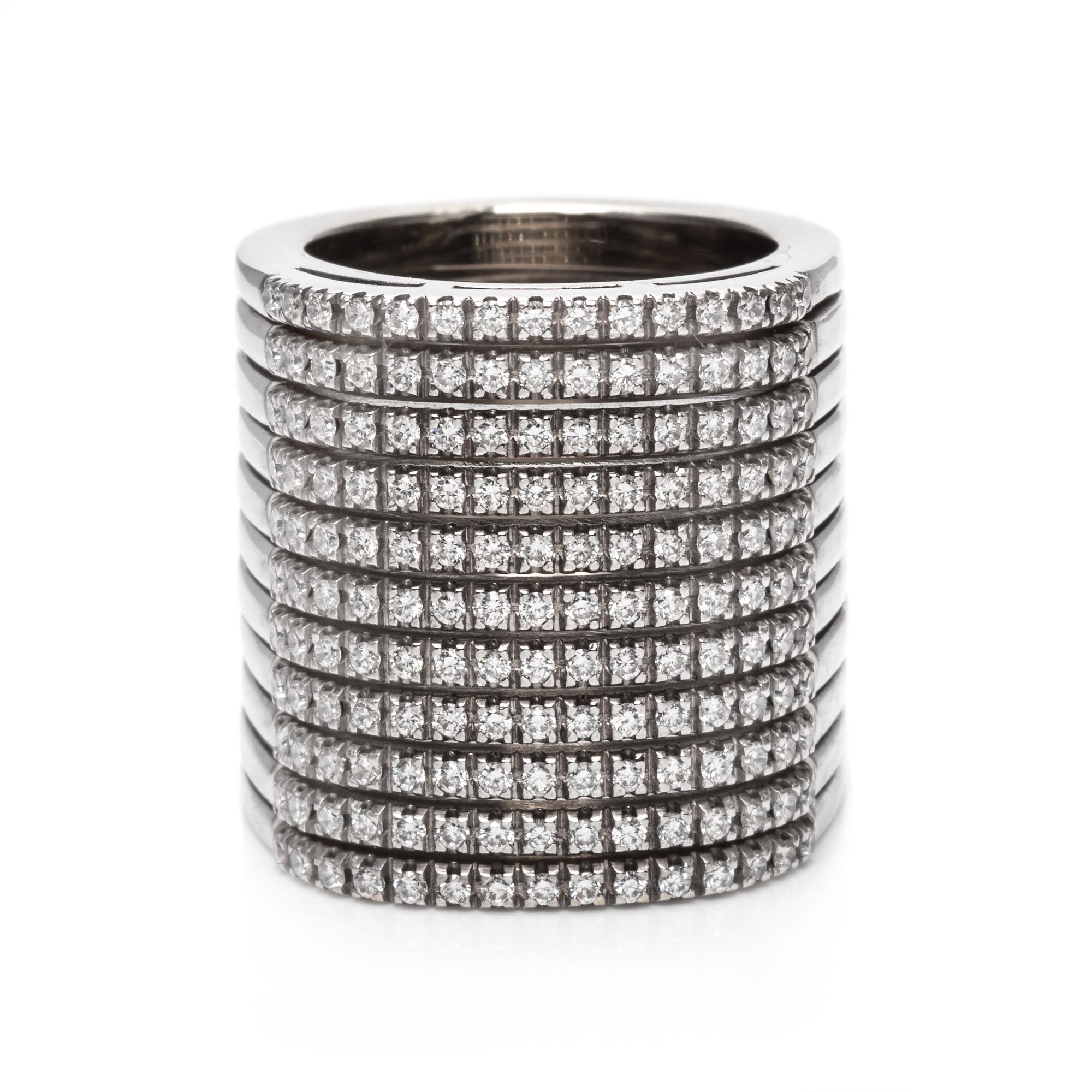 An 18 Karat White Gold and Diamond Ring,