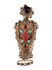 A Continental Jeweled Silver Figural Scent Bottle and Hand Seal