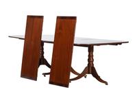 An Irish Regency Mahogany Triple Pedestal Dining Table