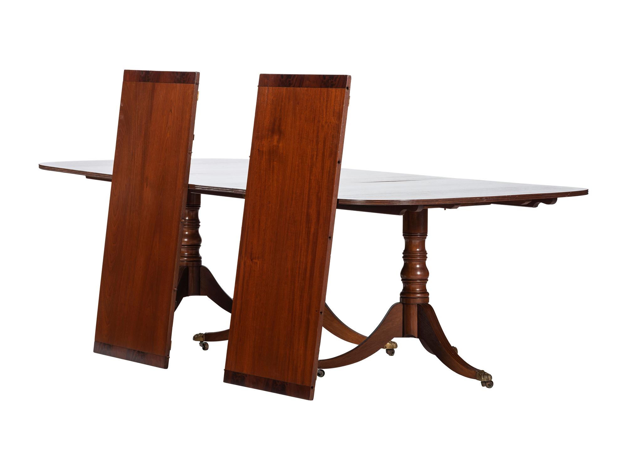 An Irish Regency Mahogany Triple Pedestal Dining Table