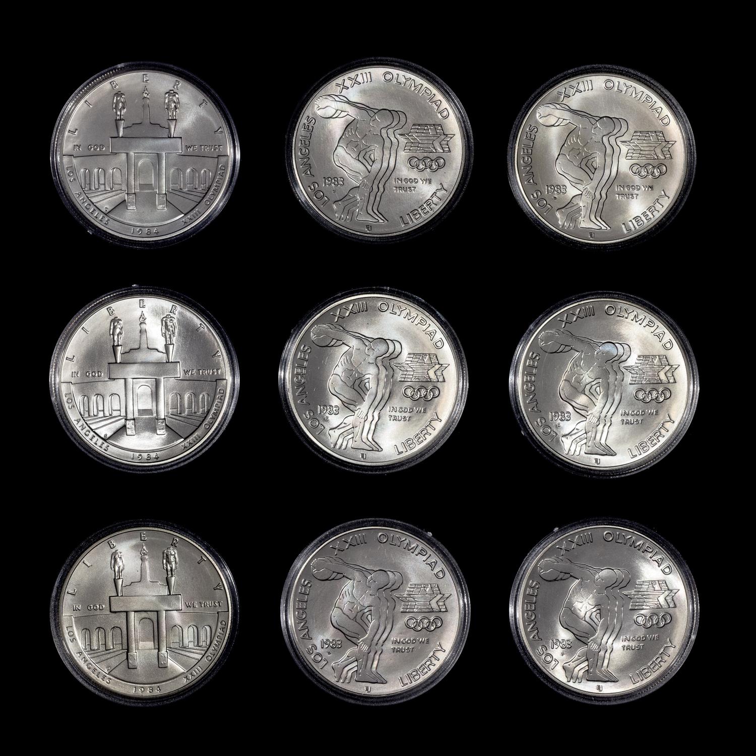 * A Group of Three United States 1983-P,S,D Los Angeles Summer Olympiad Silver Dollar Set
