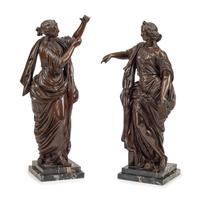 A Pair of French Patinated Bronze Figures