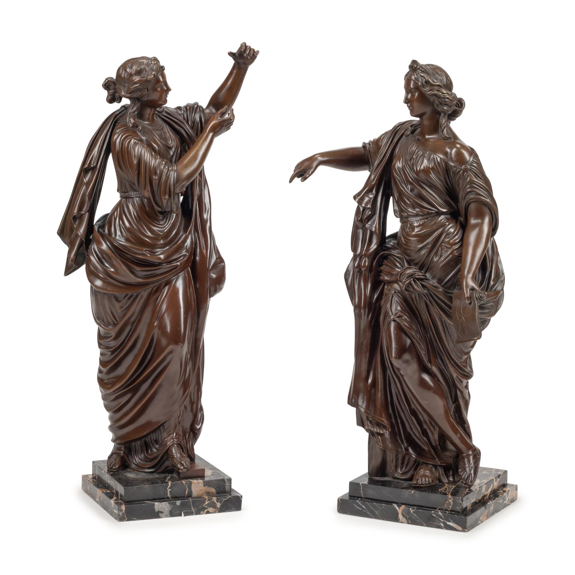 A Pair of French Patinated Bronze Figures