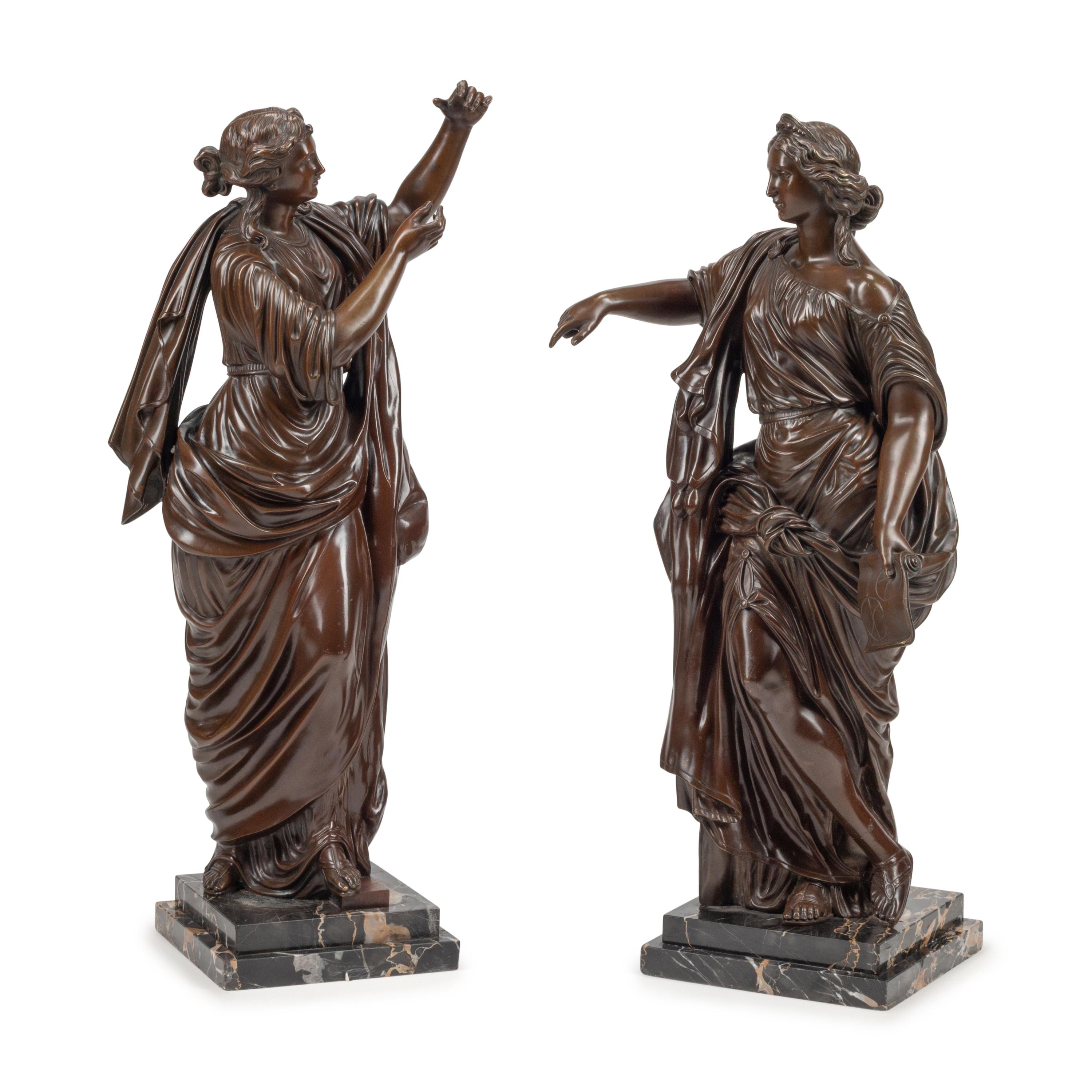 A Pair of French Patinated Bronze Figures
