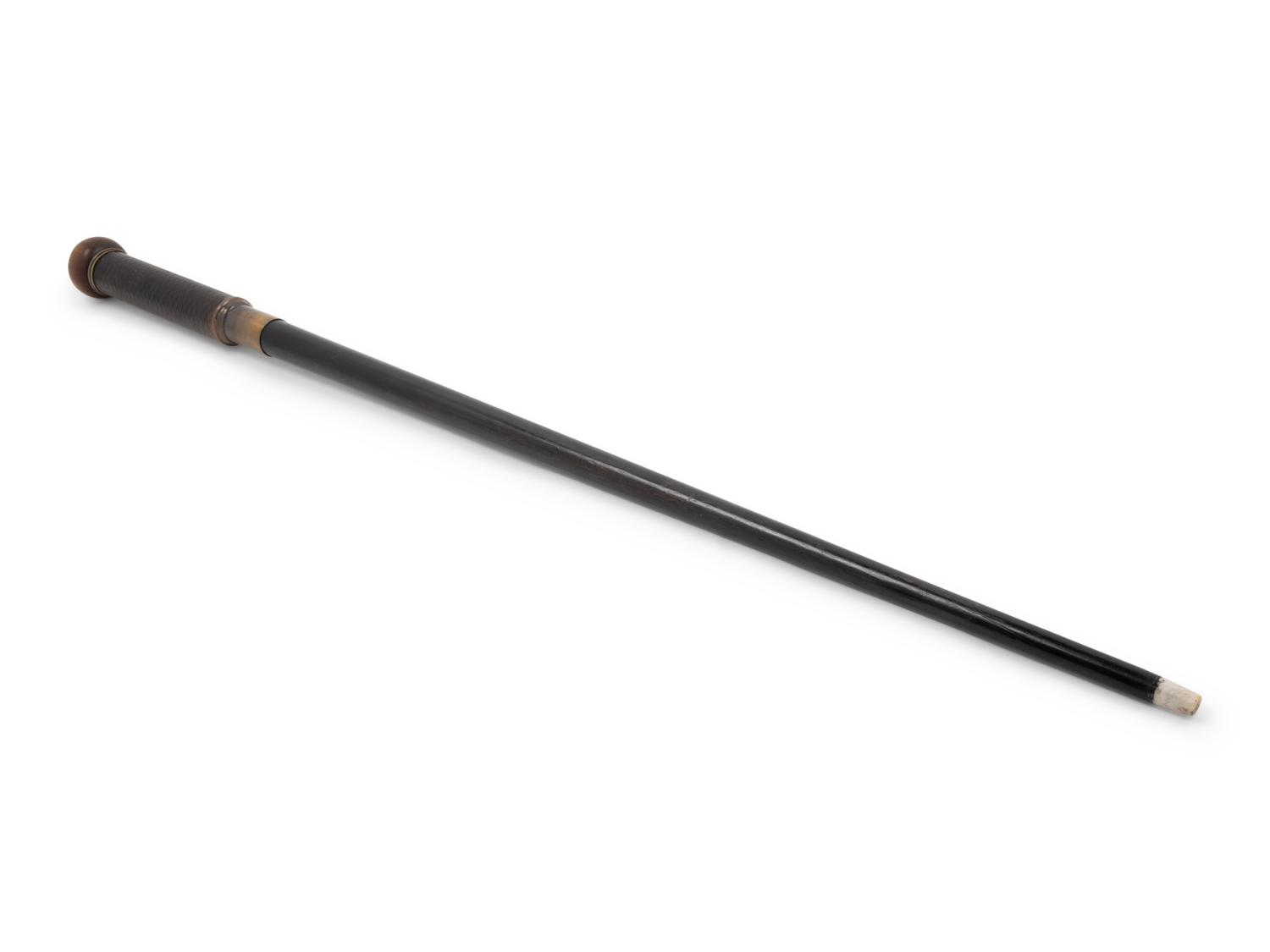 An English Brass-Mounted and Leather-Wrapped Explorer's Walking Stick
