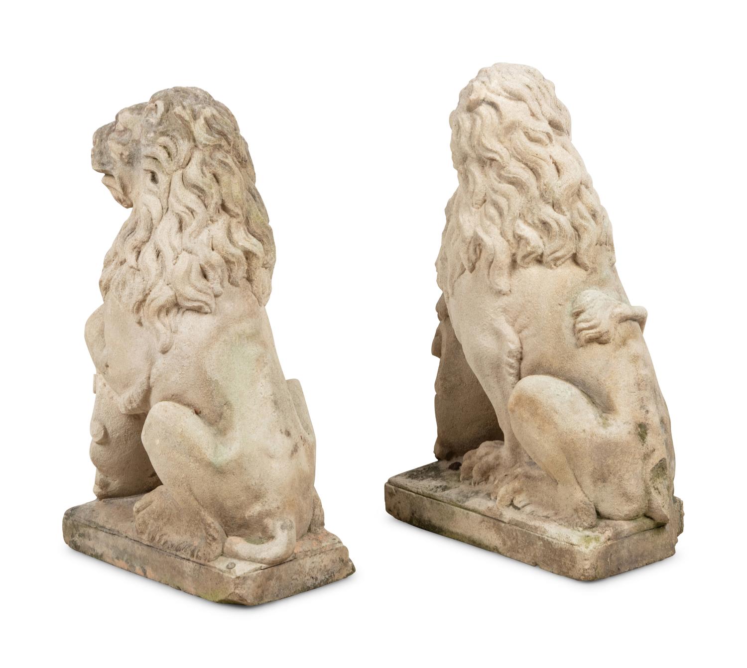 A Pair of Cast Stone Model Lions