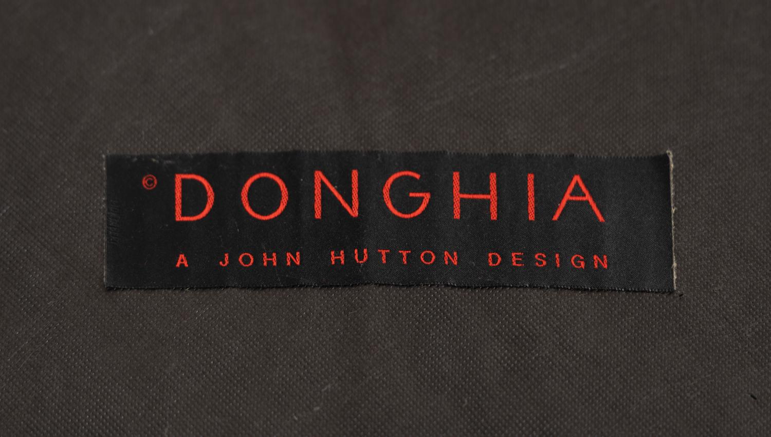 A Pair of Donghia Lounge Chairs and Ottoman