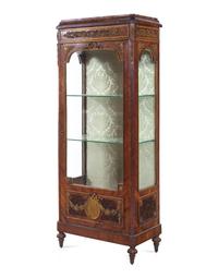 A Louis XVI Style Gilt Bronze Mounted Kingwood Vitrine Cabinet
