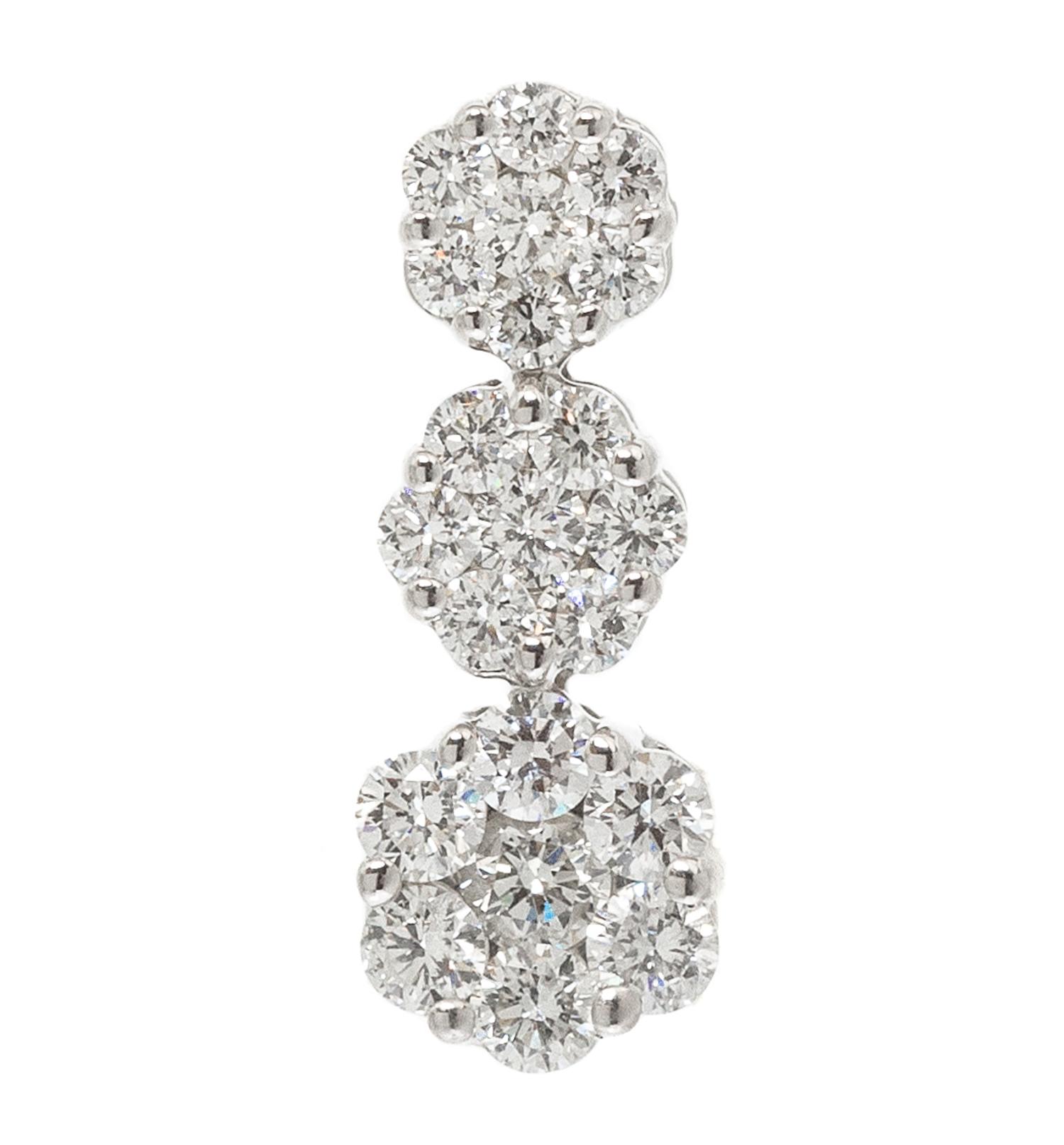 A White Gold and Diamond Cluster Pendant, 1.00 dwts.
