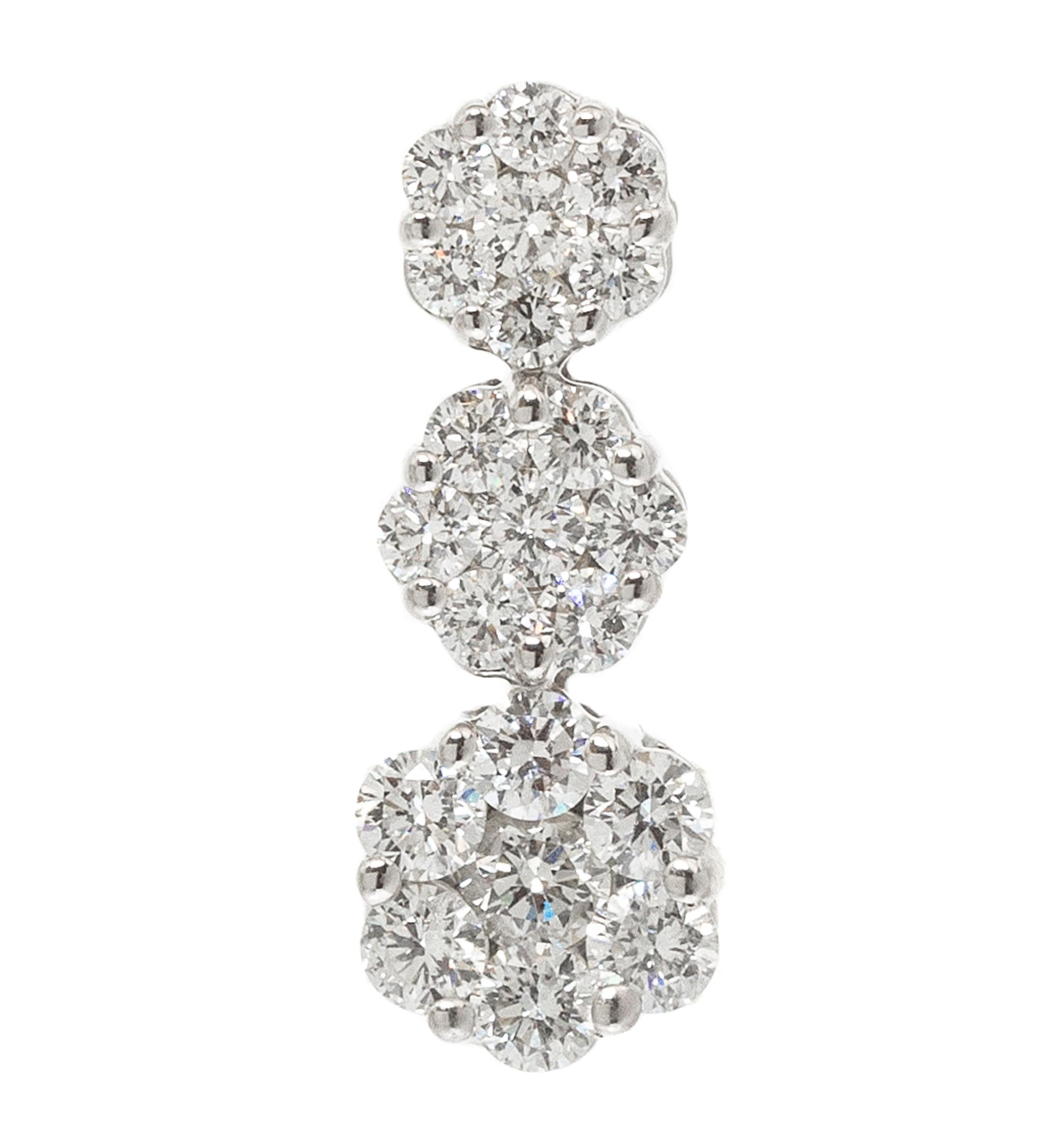 A White Gold and Diamond Cluster Pendant, 1.00 dwts.