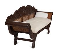 A British Colonial Carved Mahogany and Cane Work Settee