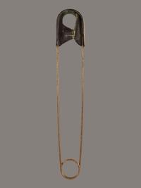 A Gold Painted Bronze Safety Pin Shop Sign