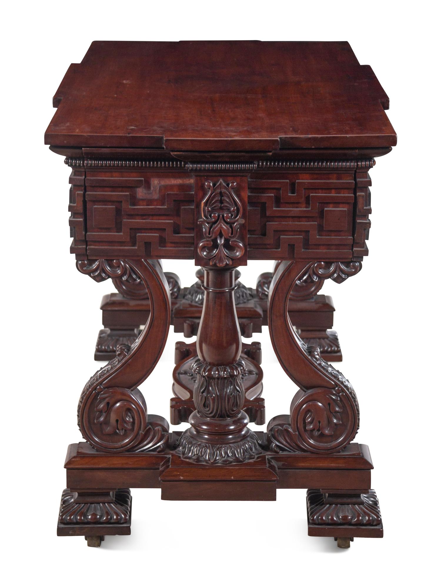 A Continental Carved Mahogany Metamorphic Library Table and Ladder