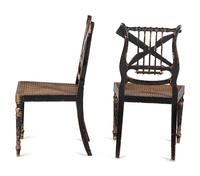 A Pair of Classical Gilt and Black Painted Lyre-Back Cane Upholstered Side Chairs