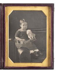 [EARLY PHOTOGRAPHY]. Half plate daguerreotype of a three-year-old girl and her toy dog.