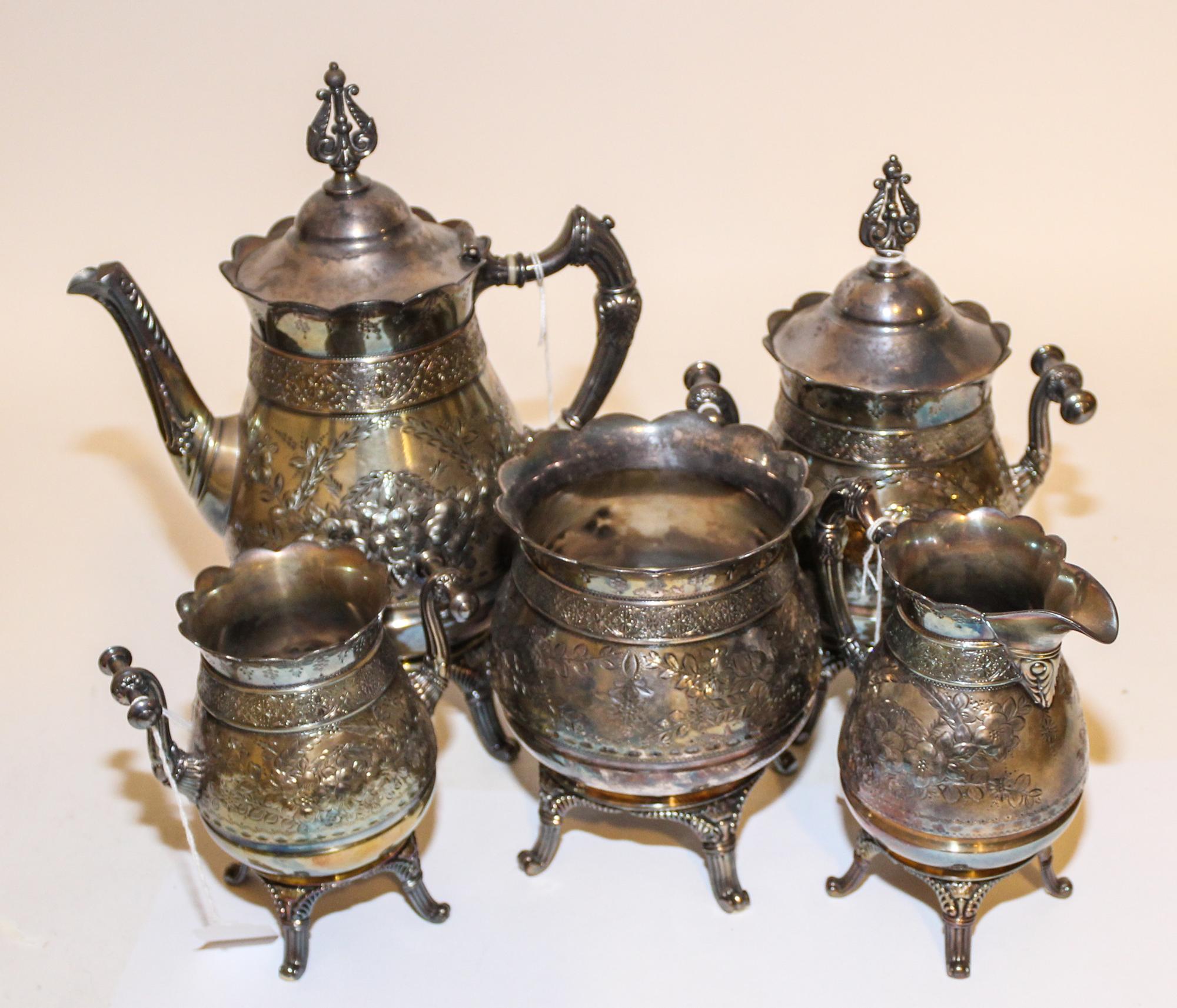 An American Silver-Plate Five Piece Tea Service, , comprising a teapot, covered jar, creamer, sugar and wastebowl.