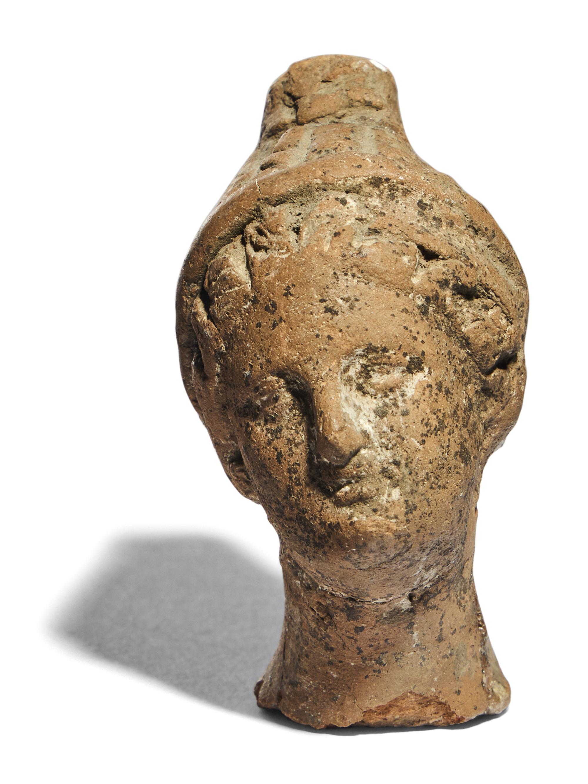 A Greek Terracotta Female Head