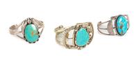 Three Southwestern Silver and Turquoise Bracelets Length of largest 6 x opening 7/8 x width 1 3/4 inches