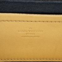 Louis Vuitton, Coussin Bag in Gold Empreinte Leather