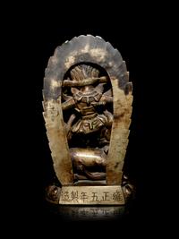 A Tibetan Gilt Bronze Figure of Mahakala and Consort