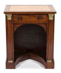 A Regency Walnut Gilt Metal Mounted Knee-Hole Desk Height 29 x width 24 x depth 18 inches. — 19TH CENTURY